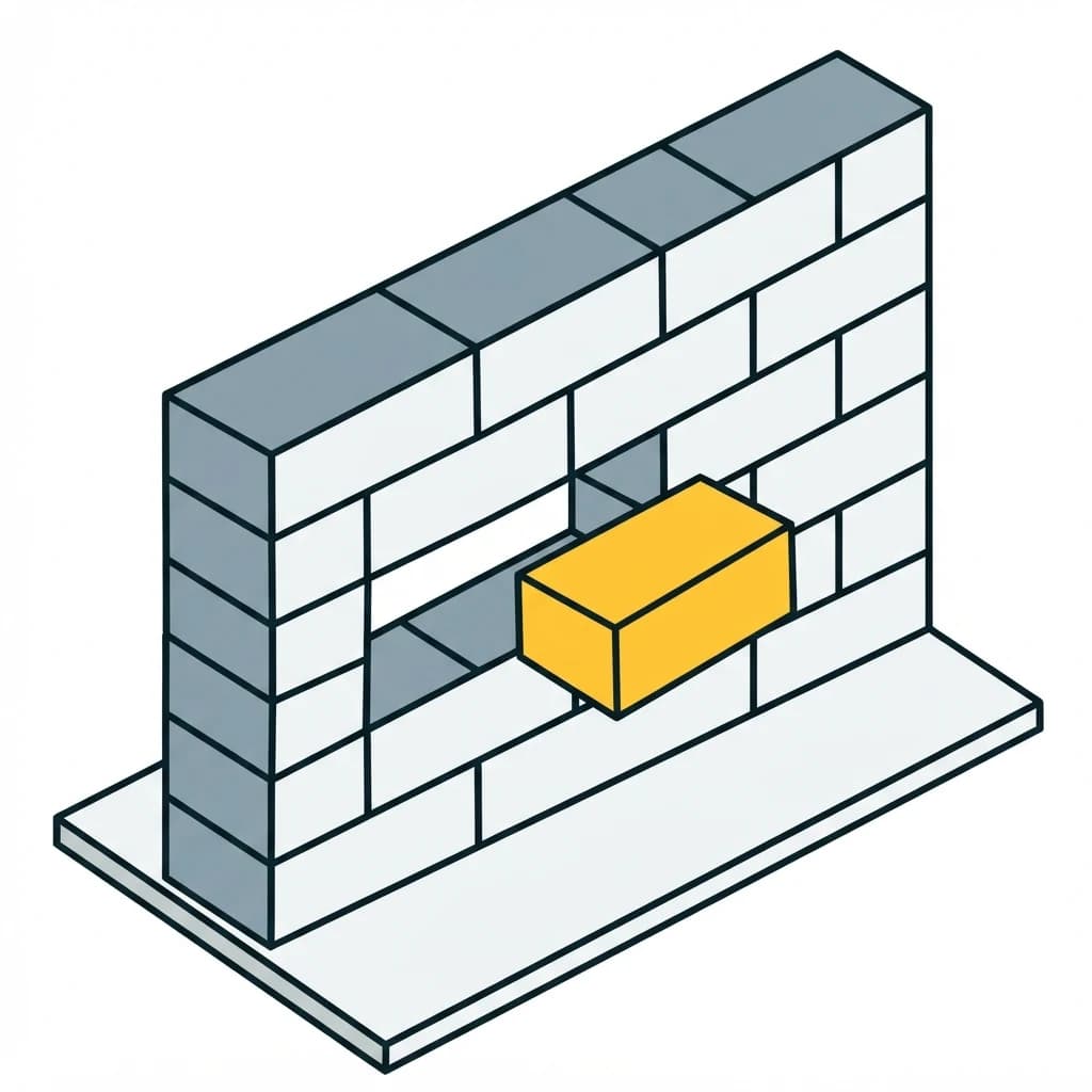 A wall of blocks with one drawn part way out, the wall intact around it.